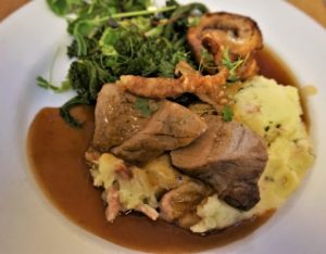 packington duo of fillet and slow cooked belly pork wilted greens sarladaise potatoes cider gravy