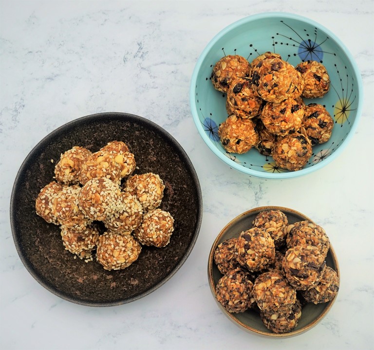 three bowls of differently flavoured oat bites