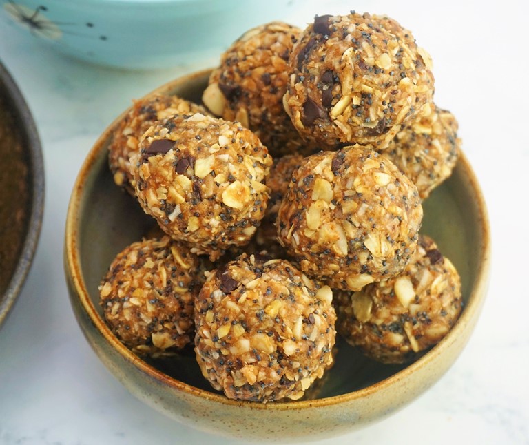 a bowl of peanut and chocolate oat bites