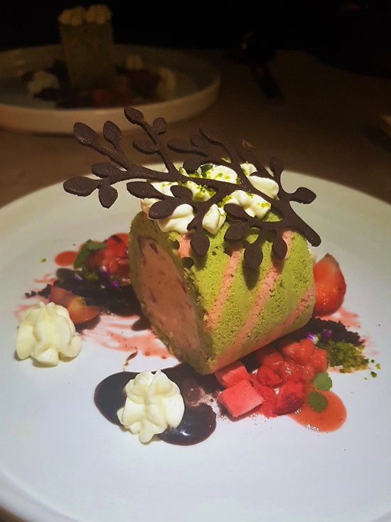 strawberry pistachio dessert from a tasting menu at The Flintlock