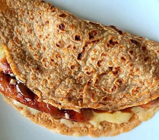 Staffordshire Oatcake with sausage cheese brown sauce