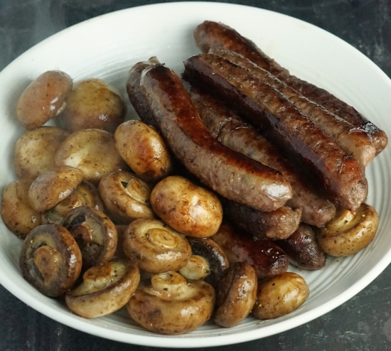 browned mushrooms and sausages for Venison Sausage Casserole