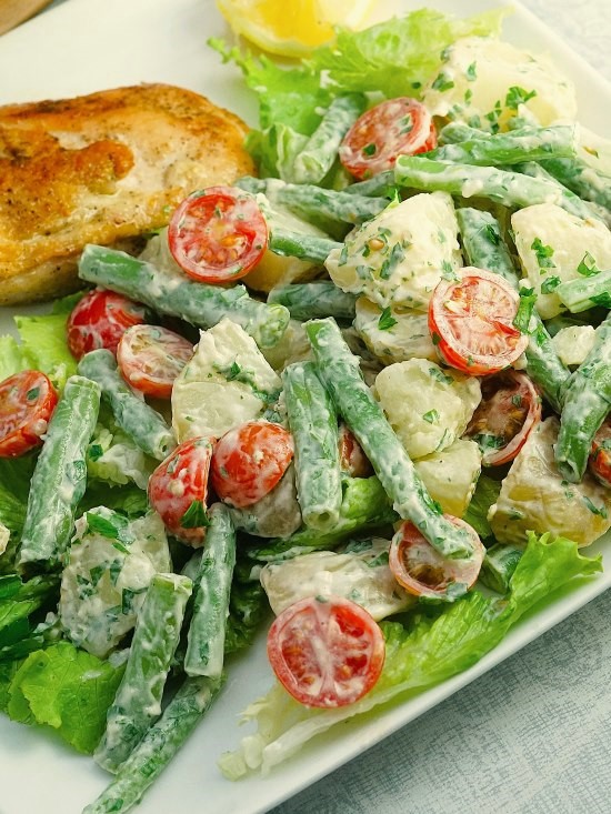 Green Bean, Tomato and Potato Salad with Aioli on lettuce with chicken breast