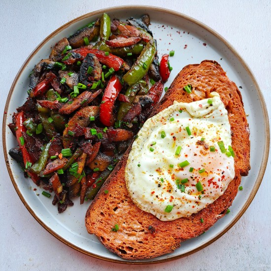 toasted Beetroot Bread with egg and sauteed vegetables