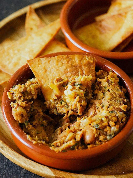 Refried Beans with cheese and homemade tortilla chips