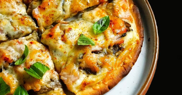 White Flatbread Pizza with Ham and Mushrooms