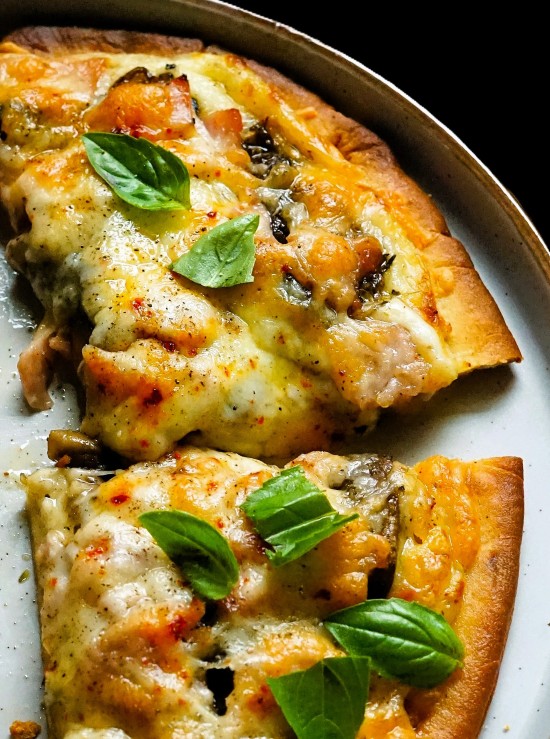 White Flatbread Pizza with Ham and Mushrooms