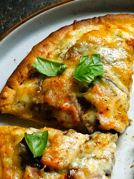 White Flatbread Pizza with Ham and Mushrooms