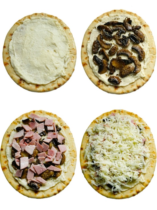 making White Flatbread Pizza with Ham and Mushrooms