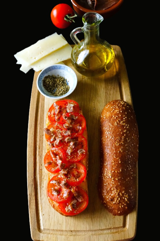 making Pane Cunzato (Sicilian 'seasoned bread')