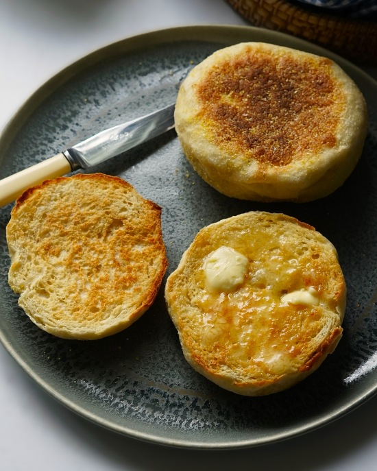 English Muffins split, toasted and spread with butter