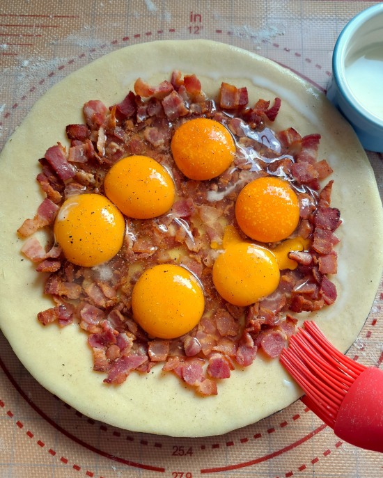 adding filling to Egg & Bacon Pie adding filling to Egg & Bacon Pie