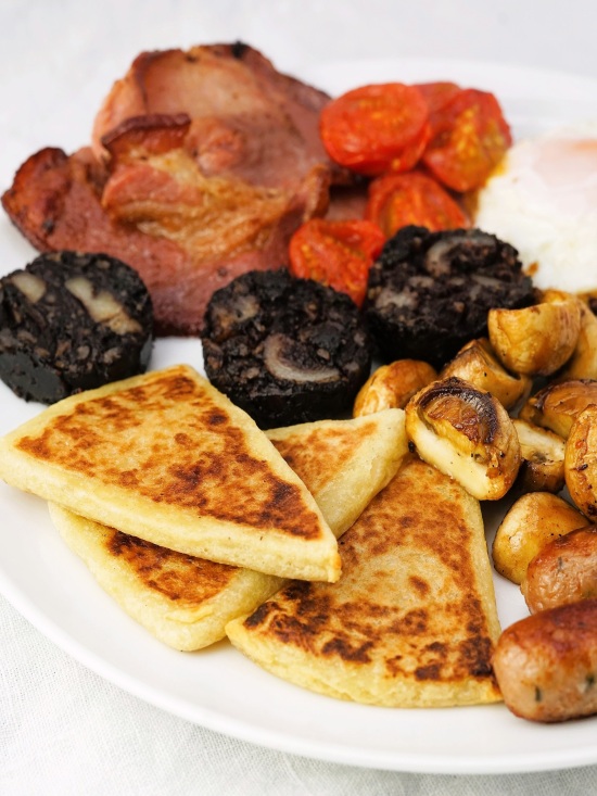 big breakfast with Potato Farls, Irish potato cakes, potato bread, potato scones, tattie scones