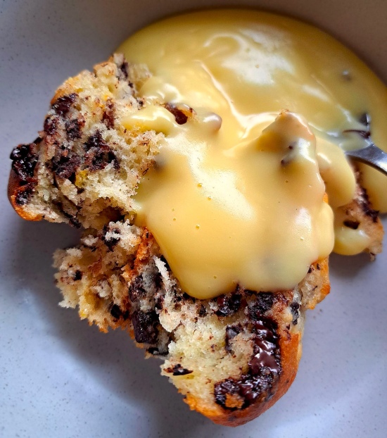 Sultana, Chocolate & Orange Muffins served hot with custard Sultana, Chocolate & Orange Muffins served hot with custard